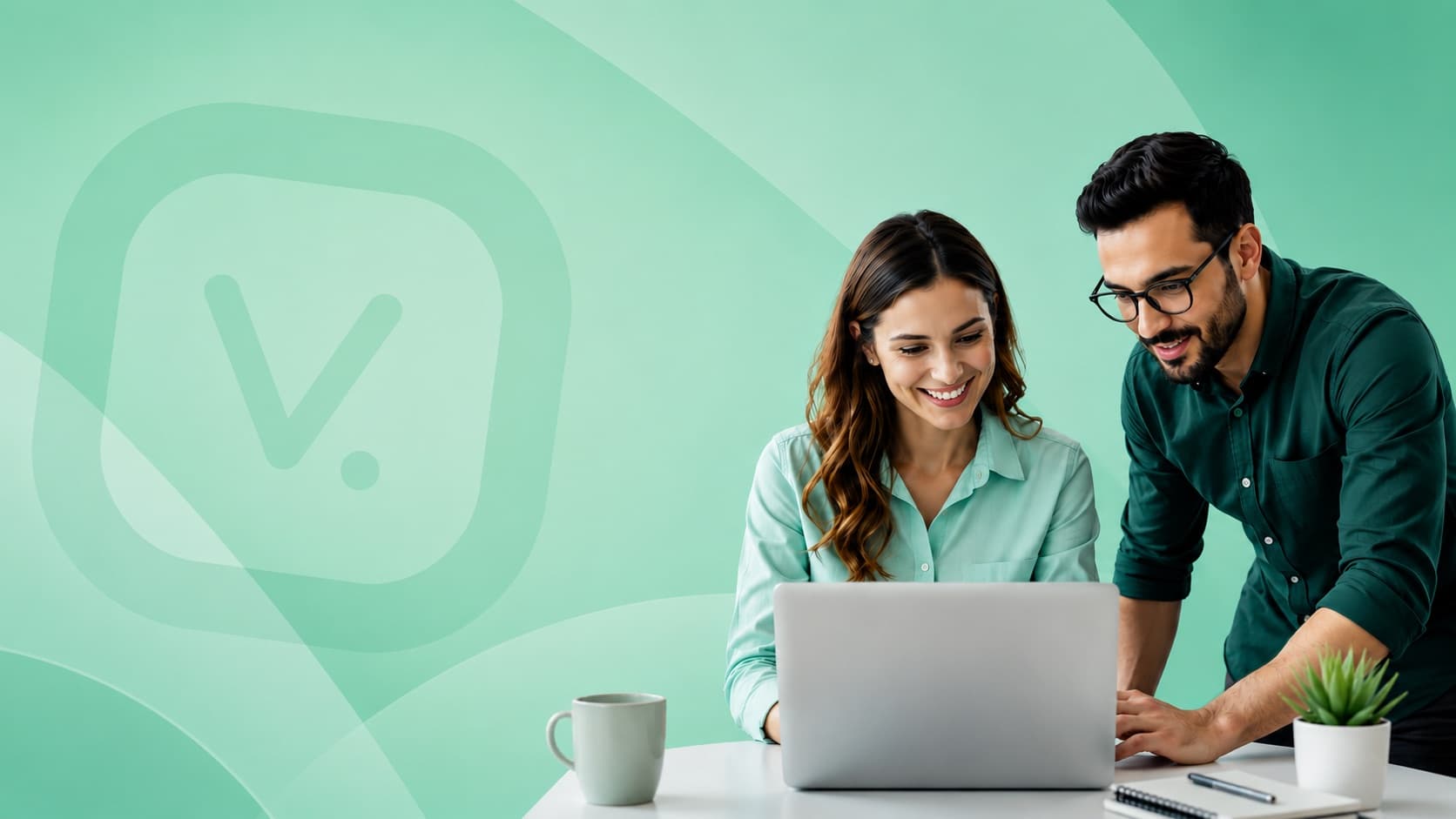Two business owners working through their day together in Vertiqa on a laptop